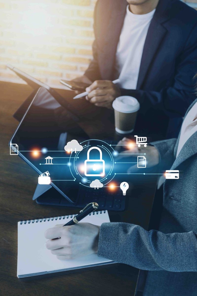 Cybersecurity and privacy concepts to protect data. Lock icon and internet network security technology. Businessman protecting personal data on smart phone with virtual screen interfaces.